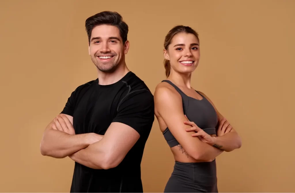an energetic fitness duo is posing confidently aga utc