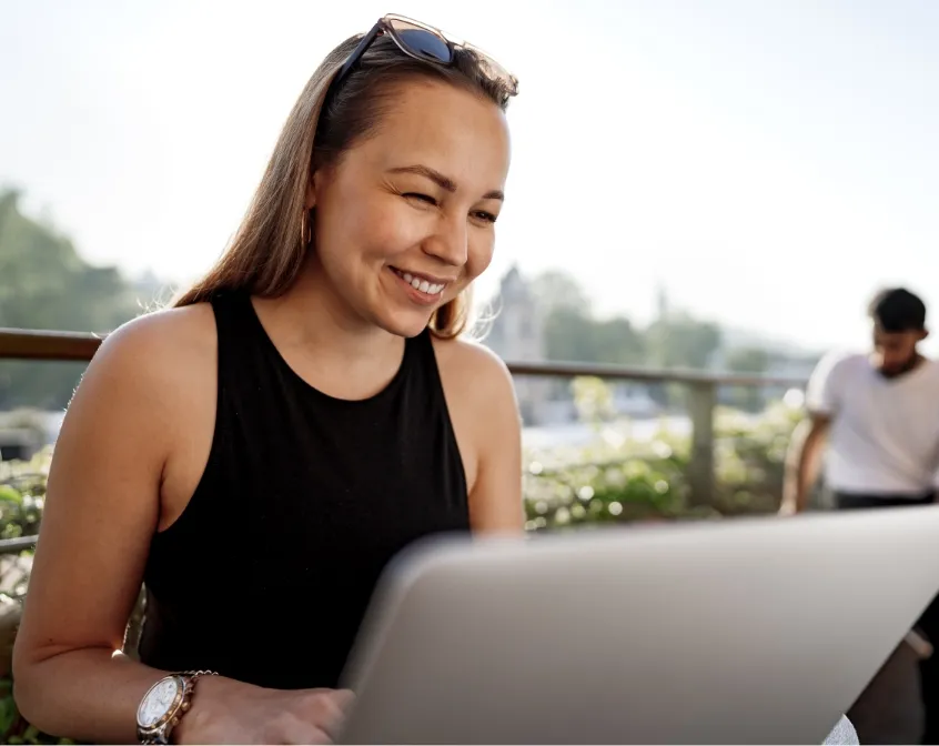 young blonde businesswoman using laptop working at utc